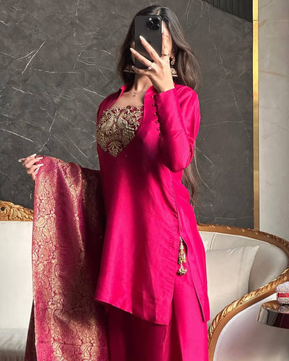 A Vision of Confidence in a Stylish Pink Suit