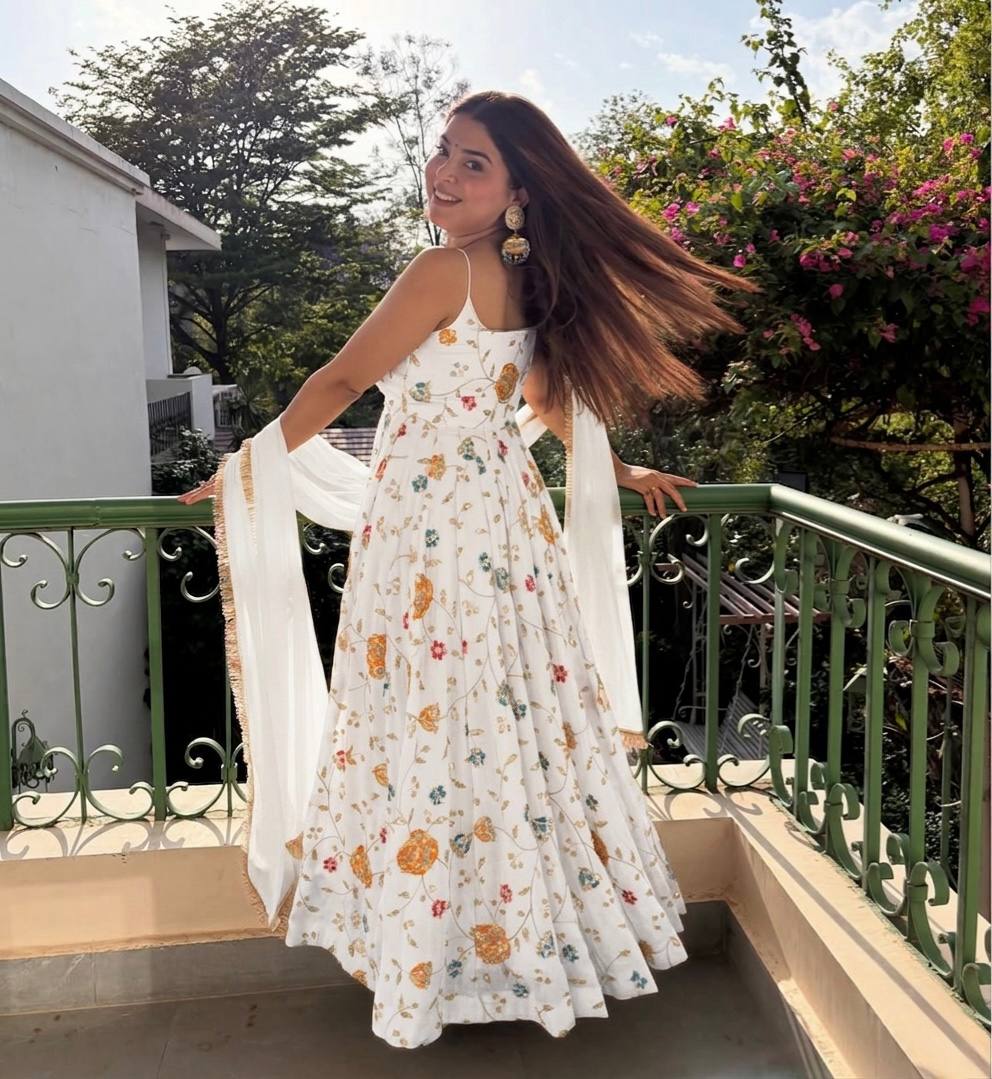 Karnika wirling Through Golden Anarkali