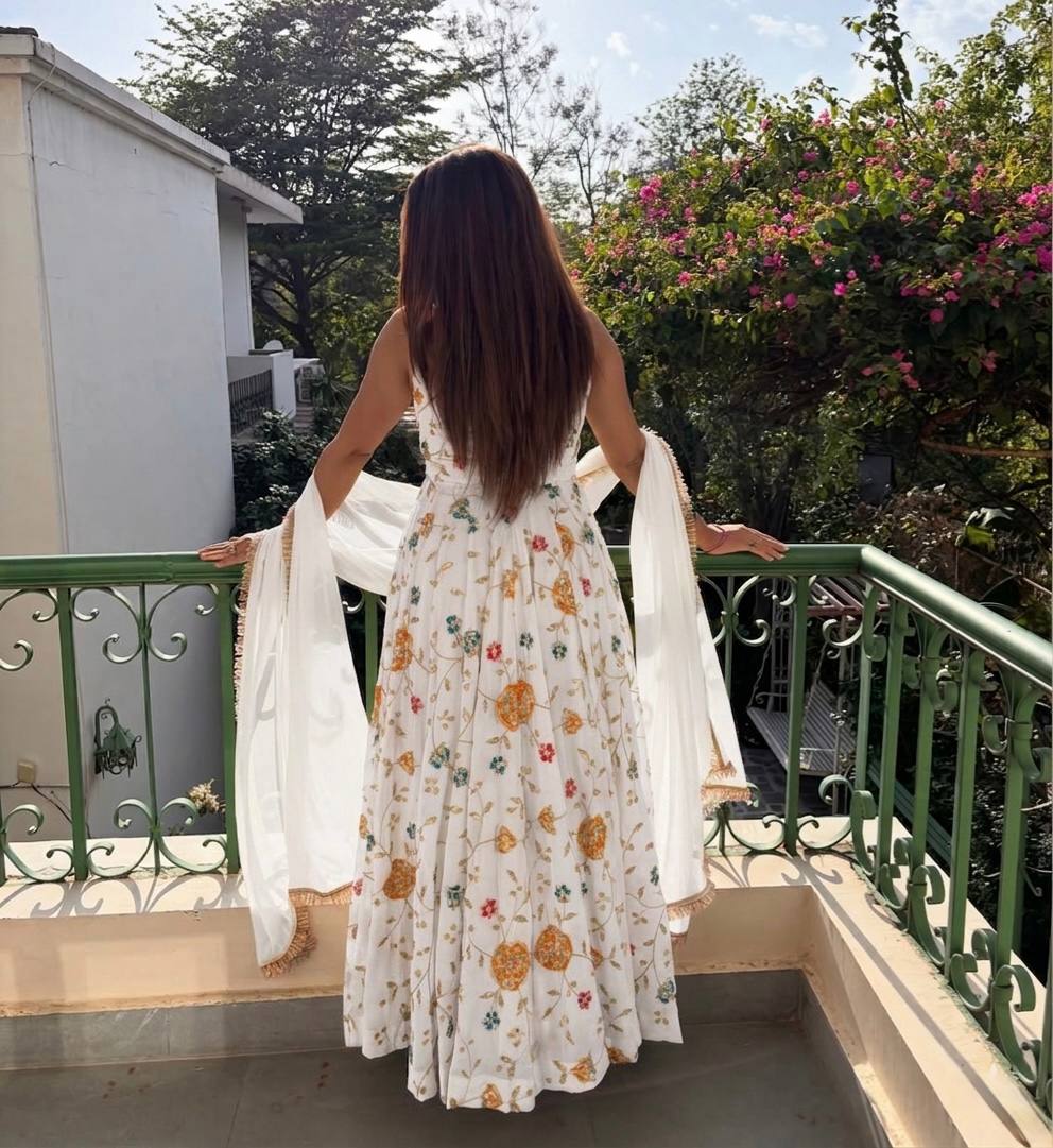 Karnika wirling Through Golden Anarkali