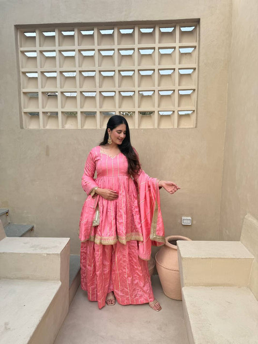 These outfits appear to be Anarkali Kurta Sets with Dupatta