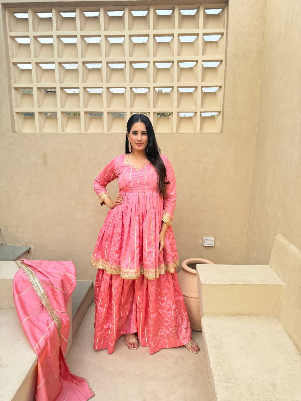 These outfits appear to be Anarkali Kurta Sets with Dupatta
