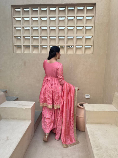 These outfits appear to be Anarkali Kurta Sets with Dupatta