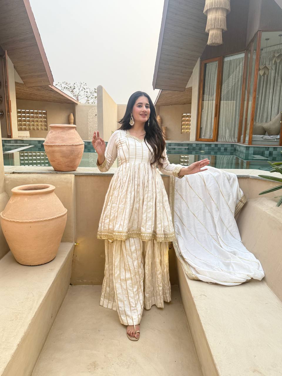 These outfits appear to be Anarkali Kurta Sets with Dupatta