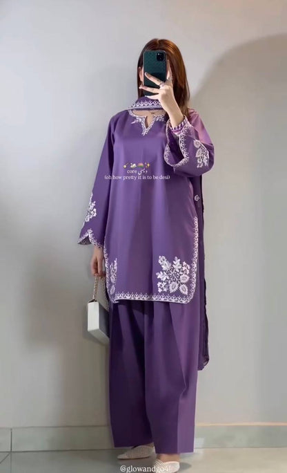 Graceful in purple, redefining elegance with modern ethnic charm