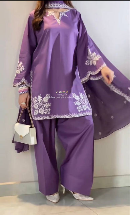 Graceful in purple, redefining elegance with modern ethnic charm